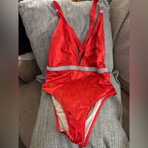 Victoria's Secret Red bathing suit. Never worn. New. Hygiene tape present